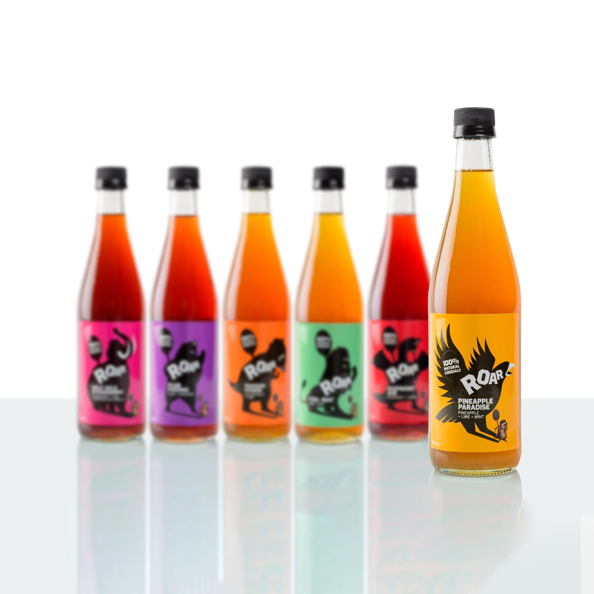 All natural pineapple cordial highlighted in group photo of Roar Living entire 100% natural cordial range.